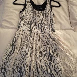 Black dress with a white floral overlay